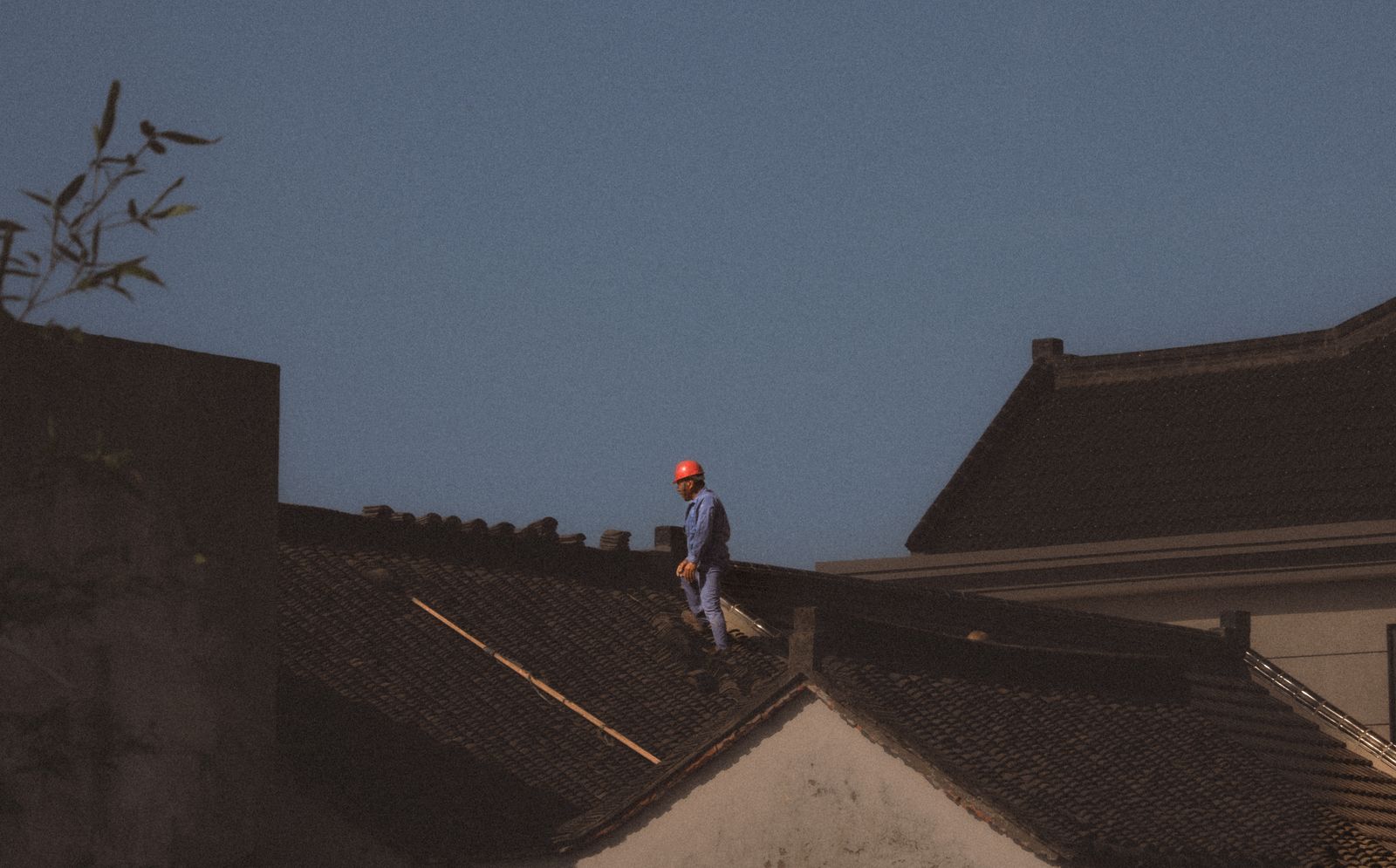 Worker on a residential roof
