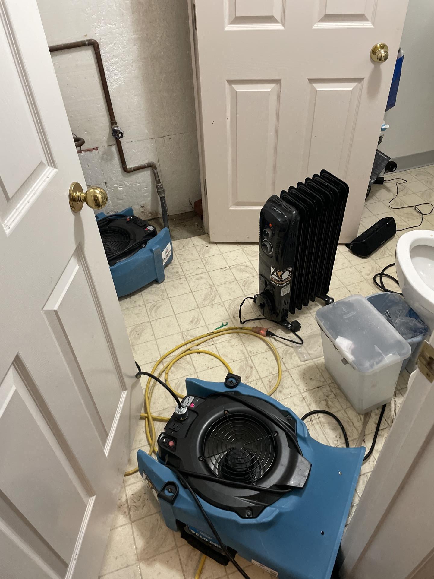 Air movers in a utility room